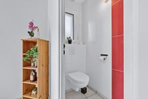 a bathroom with a toilet and a shower at Location Vacances Chorges in Chorges +30 photos