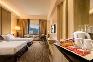 Postel nebo postele na pokoji v ubytování Sunway Hotel Georgetown Penang
