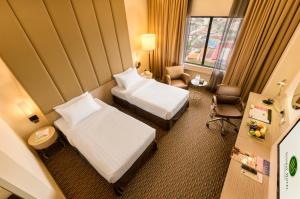 Postel nebo postele na pokoji v ubytování Sunway Hotel Georgetown Penang