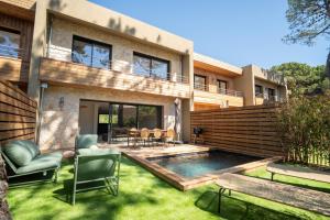 a house with a swimming pool in the yard at Strada Rossa in Lecci