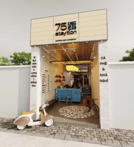 a scooter parked in front of a building at 75 Staytion in Bien Hoa