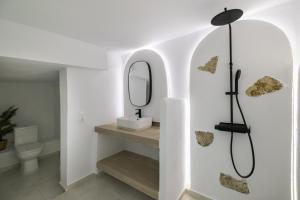 a bathroom with a shower and a mirror at m&m in Vourvourou +89 photos
