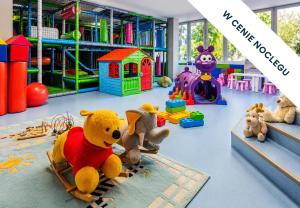 a group of stuffed animals in a play room at Prawdzic Family Resort & Wellness in Gdańsk
