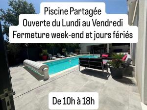 a house with a pool and a sign that reads prestige paradise owner do lunch at Charmant Studio in La Motte-dʼAigues