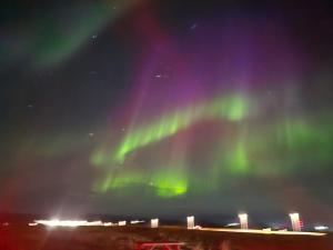 an image of the northern lights in the sky at KEF QuickStay Apartments in Keflavík