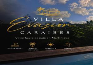 a sign for a villa vacation car rentals at Évasion Caraïbes in Ducos +1 photo