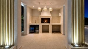 an empty hallway with a fireplace in a house at Villa Stone in Smoković +51 photos