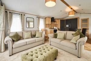 a living room with two couches and a couch at Host & Stay - Rose Lodge in Pocklington