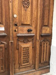 an old wooden door of a building at Altstadtmeise Elegance in Meisenheim