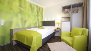 TV a/nebo společenská místnost v ubytování Garten-Hotel Ponick