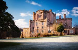 an old castle on a sunny day at Dalhousie Castle in Bonnyrigg