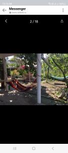 a picture of a playground with a slide at mianino in Itʼkhvisi