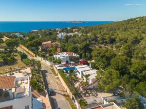 an aerial view of a town with the ocean at Holiday Home Anromi by Interhome in Cala Vadella