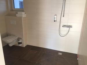 Łazienka w obiekcie Burg Rooms - 24h Self-Check-in
