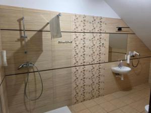a bathroom with a shower and a sink at Potocki Dwór in Jędrzejów +35 photos