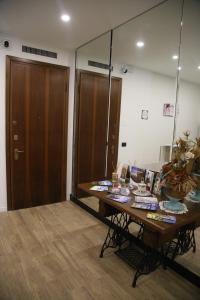 a room with a table with plates of food on it at La Torretta in Savona