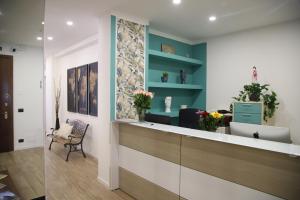 an office with a reception desk and a waiting room at La Torretta in Savona