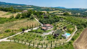 an aerial view of a estate with a vineyard at CASALE DEI GELSOMINI 8, Emma Villas in Todi