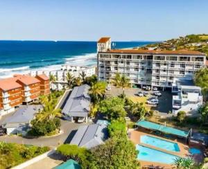 an aerial view of a hotel and the beach at Umdloti Holiday Resort 208 in Umdloti