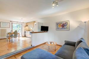 a living room with a couch and a kitchen at Ca Cornocc with Private Terrace in Gordola - Happy Rentals in Gordola +24 photos