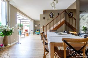 a dining room with a table and chairs at Evasion in Albi