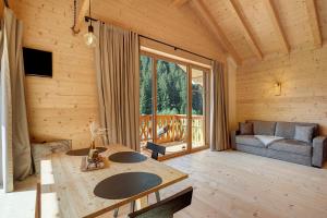 a living room with a table and a couch at Archerhof in Racines