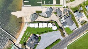 an aerial view of a building next to the water at The Inn Spot in Hampton Bays