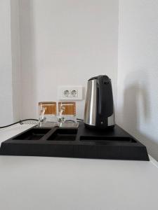 a toaster sitting on top of a kitchen counter at Keramos in Loutro