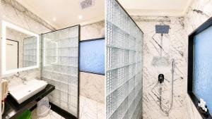 a bathroom with a sink and a shower at Hotel Mulki International in Mūlki +25 photos