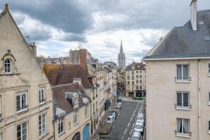 an aerial view of a city street with buildings at Murray - En plein cœur de Caen in Caen