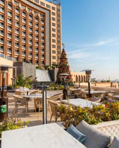 a christmas tree on the rooftop of a hotel at World Heart Hotel in Baghdād