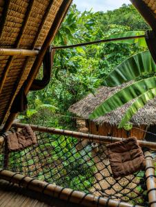 a view from the inside of a bird cage at Ecocio Explorations in Coron