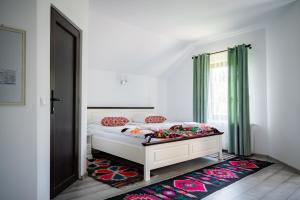 a bedroom with a bed and a window at Breb 155 in Breb