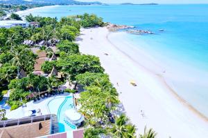 an aerial view of the beach at the excellence punta cana resort at The Fair House Beach Resort & Hotel in Chaweng Noi Beach