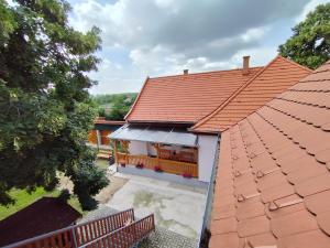 an overhead view of a house with a red roof at Levendula Vendégház - Bezi in Bezi