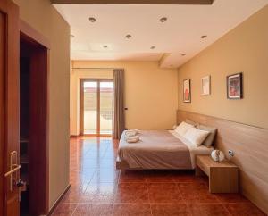 a bedroom with a bed in a room at B&B a due passi dal mare in Caulonia Marina