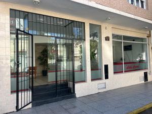 an entrance to a building with glass doors at Hanna in Mar del Plata