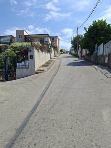 an empty street with a building on the side at Don Pedro Home in Naples