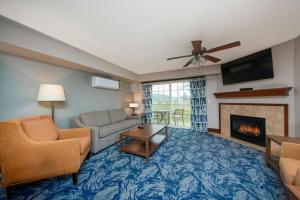 a living room with a couch and a fireplace at WorldMark Blaine in Birch Bay