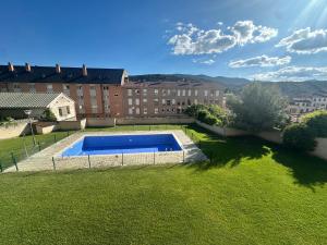 an overhead view of a swimming pool in a yard at Refugio PIRENAICO in Sabiñánigo