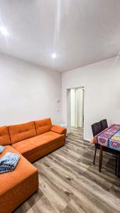 a living room with a couch and a table at B&B di Cristina in Conegliano