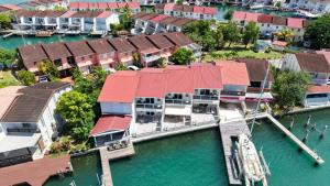 an aerial view of a house with a marina at 246D South Finger in Jolly Harbour