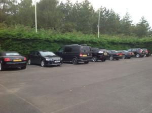 a row of cars parked in a parking lot at Graysonside in Cockermouth