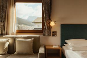 Postel nebo postele na pokoji v ubytování Hotel Digon + 83 fotografií