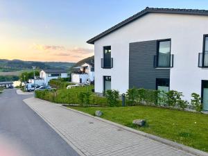a house on the side of a road at Vinkennest am Diemelsee - Sonnenweg 44 1 VN in Diemelsee