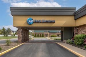 a building with a sign that reads buy best western at Best Western Woodhaven Inn in Woodhaven