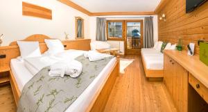 Hotel Frohnatur房間的床