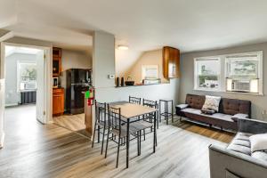 a living room with a table and chairs and a couch at Train to Philly! Pet-Friendly Unit in Barrington in Barrington +15 photos