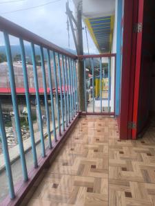 a balcony with a view of the beach at apartamento vacacional red in Salento