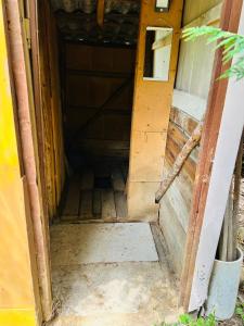 an open door of a house with a hallway at Cozy Quiet Retreat 70km from Sofia in Kyustendil